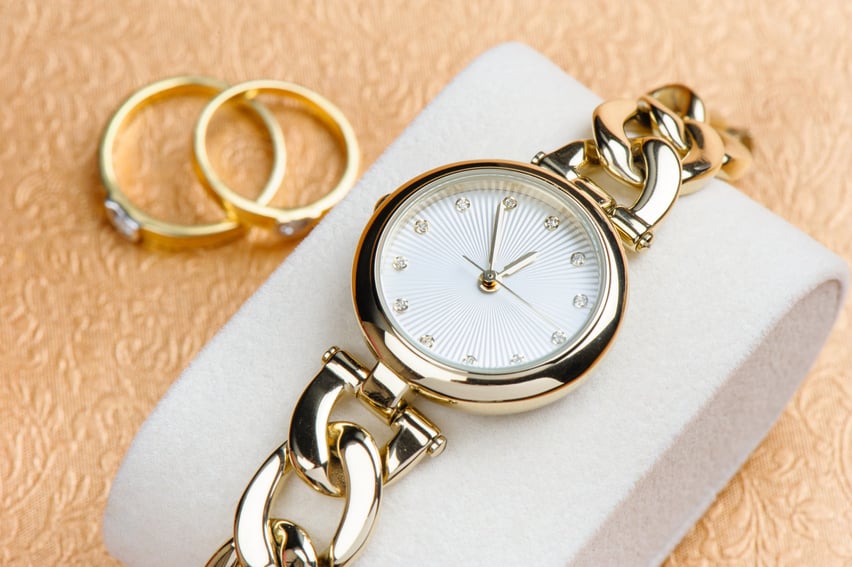 gold women wristwatch